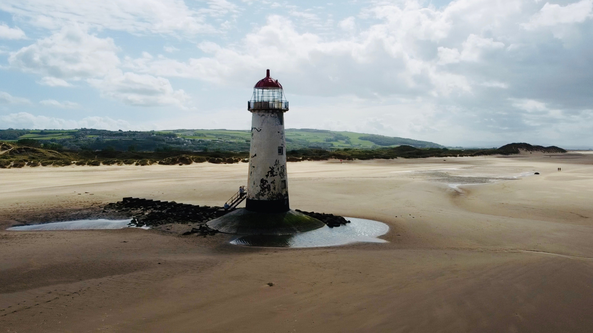 The point of Ayr lighthouse in North Wales with a drone.