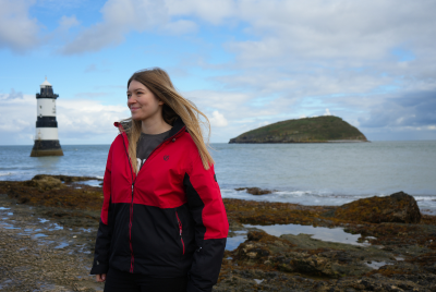 Thumbnail of The Nott'm Lass at Penmon Point lighthouse in Anglesey, with Puffin Island in the background.