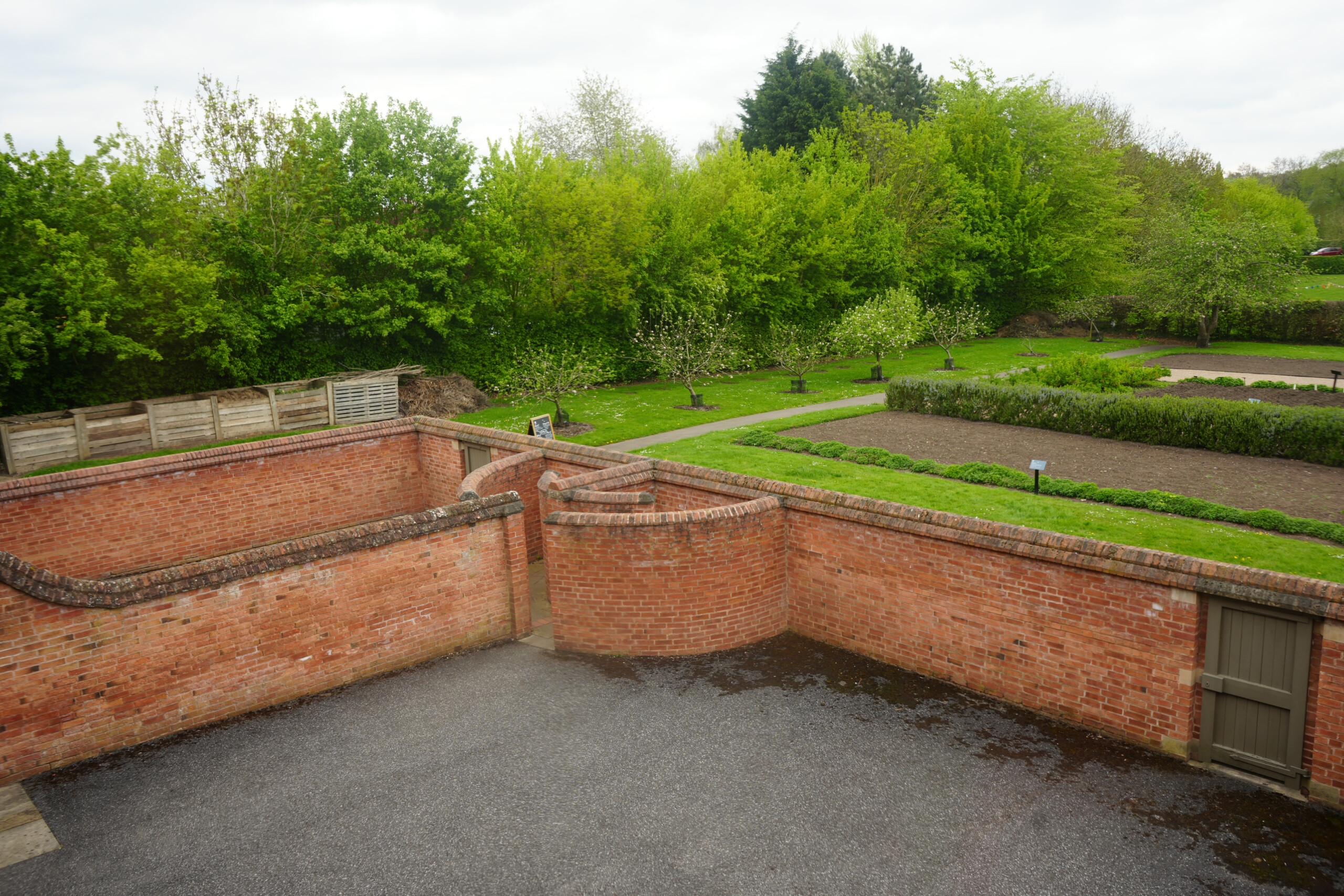 View Over Walled Yard And Kitchen Garden With Pathways And Fruit Trees Southwell Outside Area at the Workhouse in Southwell