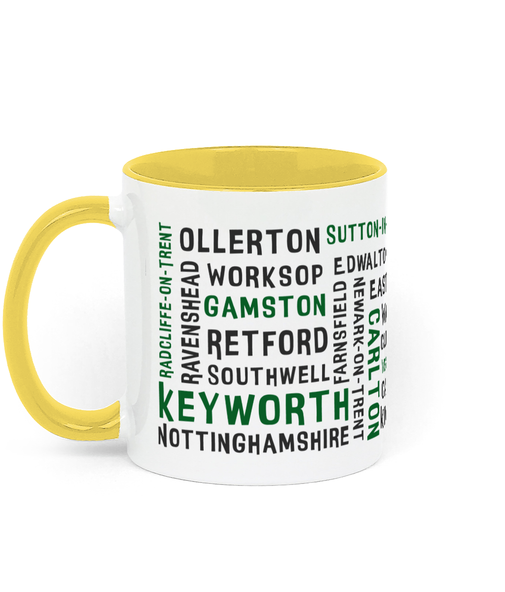 A white ceramic mug with a yellow handle and inner, featuring black and green text listing 30 Nottinghamshire places such as Keyworth, Retford, Gamston, Ravenshead, and Southwell. The handle and inner colour can be customised.